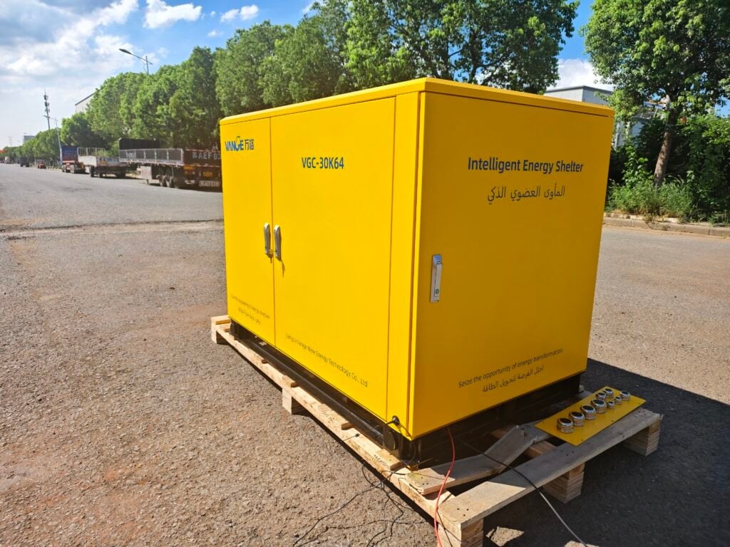 Yellow mobile energy storage cabin (15-60kW) loaded on a wooden pallet