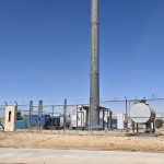 Telecom tower in Saudi Arabia powered by diesel generator and fuel tank, ready for solar-diesel microgrid upgrade
